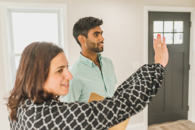 two people having a discussion indoors